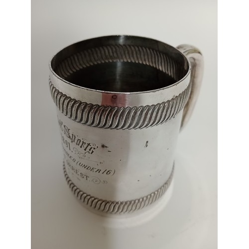 177 - A silver plated tankard engraved 