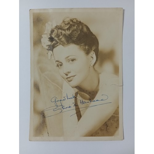 193 - Olivia De Havilland (1916-2020), British American actress, signed photograph.