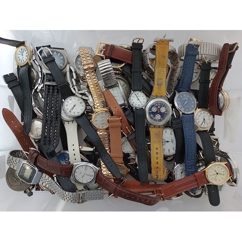 205 - A large selection of watches to include Seiko, Swatch, Sekonda, Calvin Hill, Adidas, Roamer, Timex, ... 