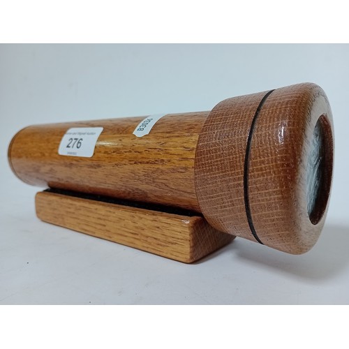 276 - A wooden kaleidoscope on stand. Approx 24cm