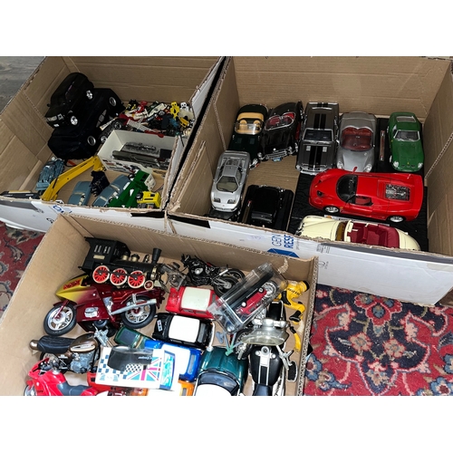 387 - 3 boxes of model vehicles including Maisto, Burago, etc.