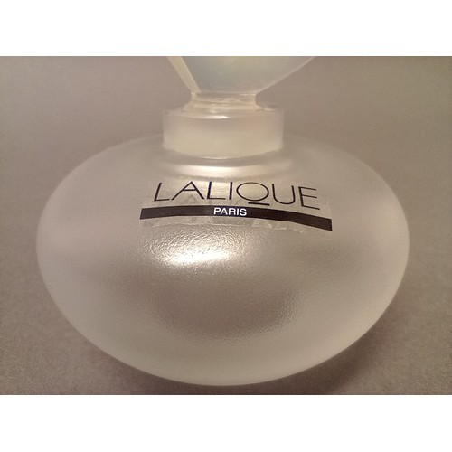 111 - A modern Lalique glass scent bottle, etched 'Lalique France', sticker to side, height 17cm. 

Condit... 