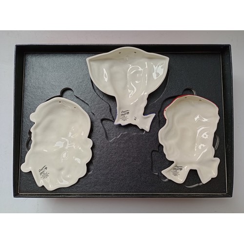 123 - A boxed set of three Wedgwood Clarice Cliff face masks,  with certificate. 

Condition - good, no da... 