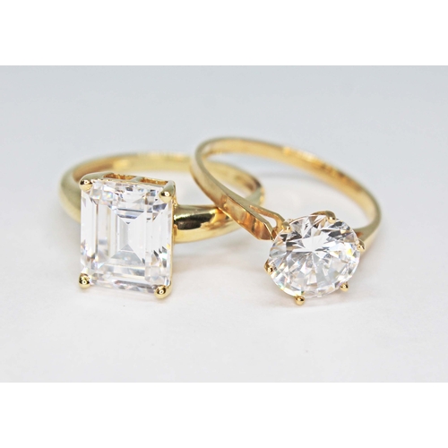 149 - Two hallmarked 14ct gold CZ solitaire rings, gross wt. 6.9g, size R.