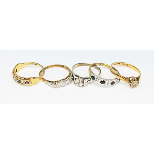 156 - Four hallmarked 9ct gold rings and another marked '18ctPLAT', gross wt. 9.1g, sizes K/L.