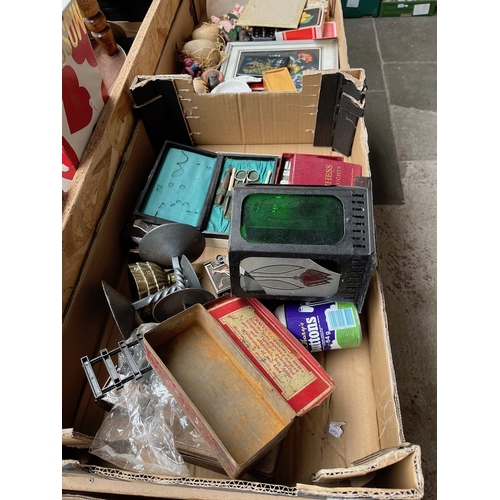 471 - Two boxes of mixed bric-a-brac and collectables.