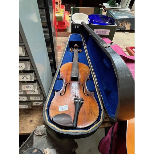 83 - An antique violin, two piece back length 362mm, with wooden case.