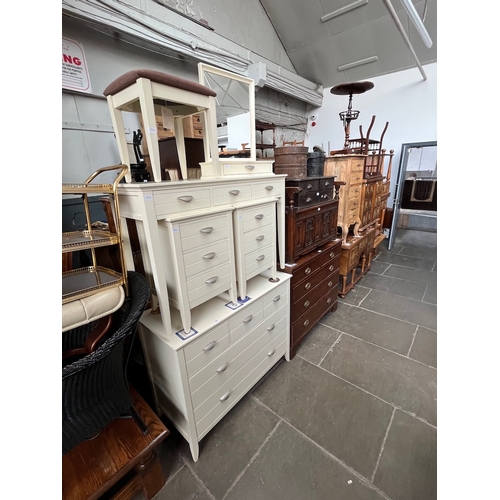 A suite of John Lewis white painted bedroom furniture comprising a