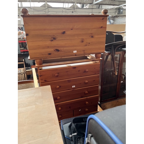 955 - Two pine chest of drawers and a pine bedding box.