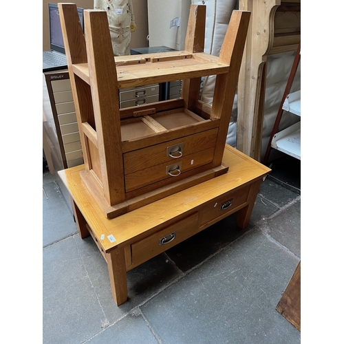 956 - A light oak coffee table and similar side table.