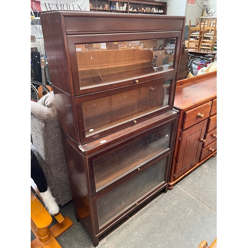 960 - An early 20th century mahogany sectional library bookcase.