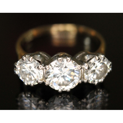 101 - A three stone diamond ring, the round brilliant cut diamonds weighing approx. 0.79, 1.36 & 0.76 cara... 