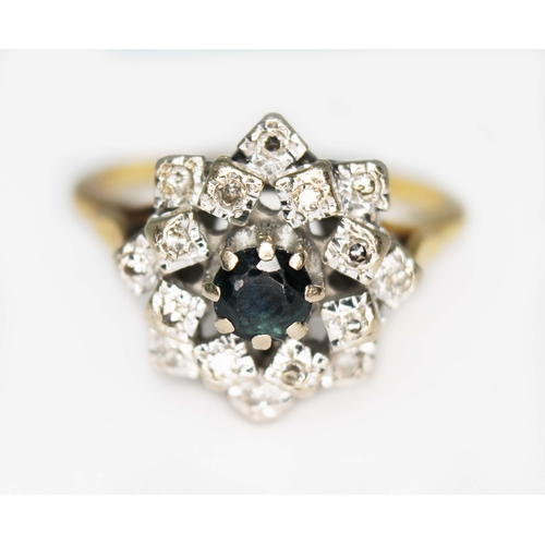 103 - A diamond and sapphire cluster ring, cluster measuring approx. 15.54mm x 15.06mm, hallmarked 18ct go... 