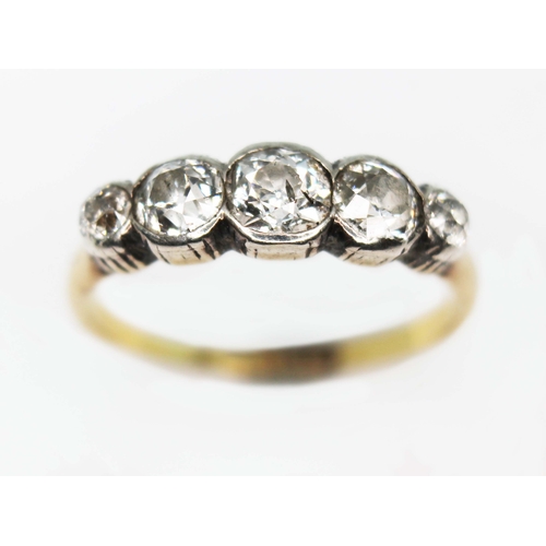 184 - An antique five stone diamond ring, the bezel set old European cut stones weighing approx. 0.10, 0.3... 