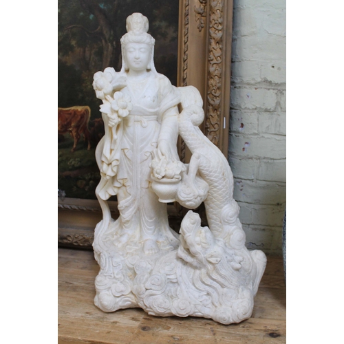 26 - A large carved marble figure, depicting a Chinese female figure with dragon and cloud base, 20th cen... 