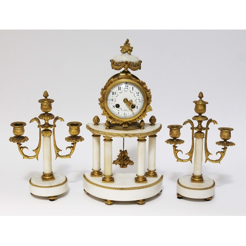 41 - A French late 19th century marble and ormolu clock garniture, height 40cm.