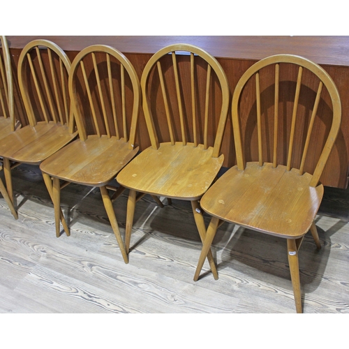 44 - A set of four Ercol blonde elm and beech chairs.