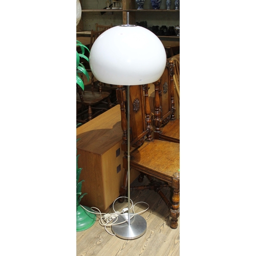 59 - A retro standard lamp with perspex shade, height 145cm.