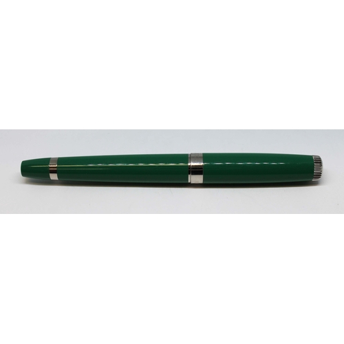 77 - A Rolex green ballpoint pen.