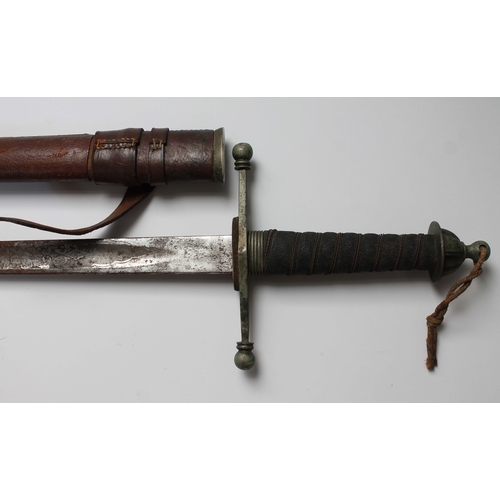 224 - A George V officer's sword, etched blade, cross hilt, wire bound fish skin grip and brass pommel, le... 