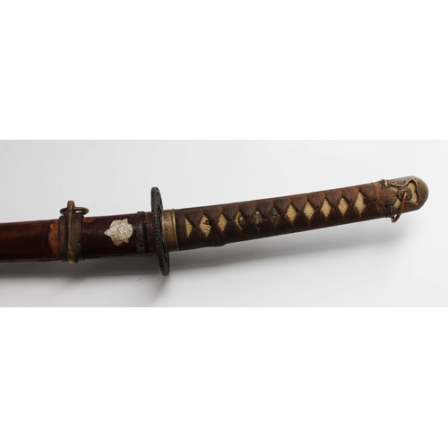 227 - A Japanese WWII officer's katana, signed tang, cast tsuba, cotton bound imitation shark skin grip, w... 