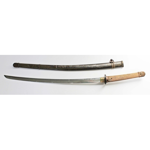 230 - A Japanese WWII officer's katana, unsigned, cast tsuba, shark skin grip, metal scabbard, length 101.... 