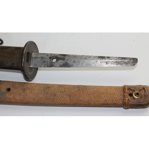 230 - A Japanese WWII officer's katana, unsigned, cast tsuba, shark skin grip, metal scabbard, length 101.... 