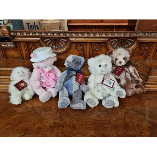 169 - A collection of 15 Charlie Bear teddies with original tags