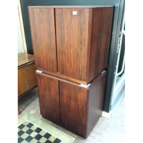 64A - A Danish rosewood sideboard and two side cabinets. CITES no. 618235/01