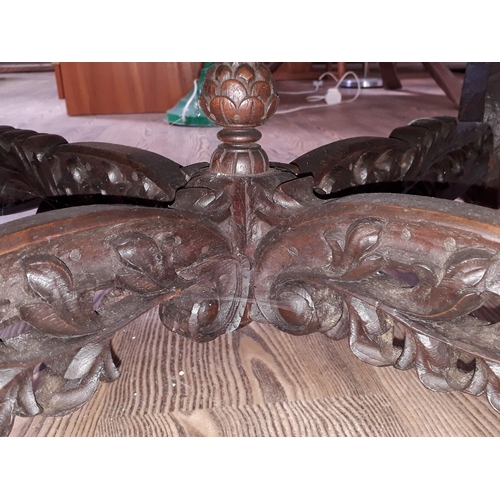 61 - A Chinese carved hardwood coffee table with onyx chess board top and resin pieces.