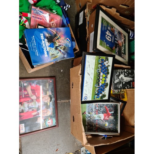 165 - Eight boxes of sporting memorabilia and ephemera including, programmes, shirts, signed pictures book... 