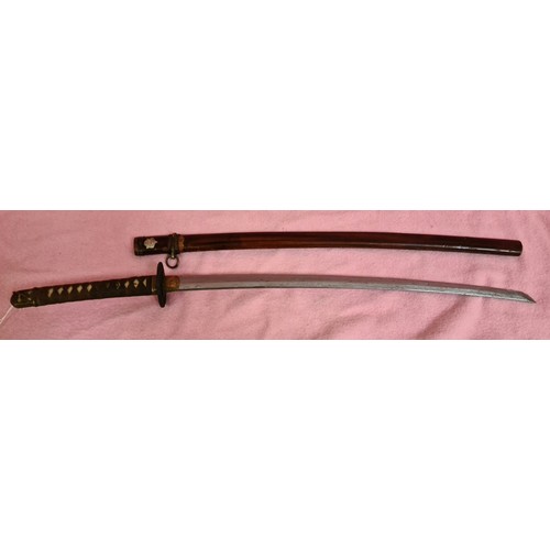 227 - A Japanese WWII officer's katana, signed tang, cast tsuba, cotton bound imitation shark skin grip, w... 