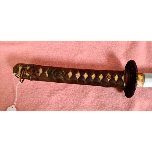 227 - A Japanese WWII officer's katana, signed tang, cast tsuba, cotton bound imitation shark skin grip, w... 