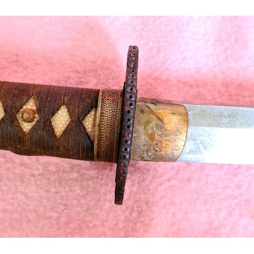 227 - A Japanese WWII officer's katana, signed tang, cast tsuba, cotton bound imitation shark skin grip, w... 