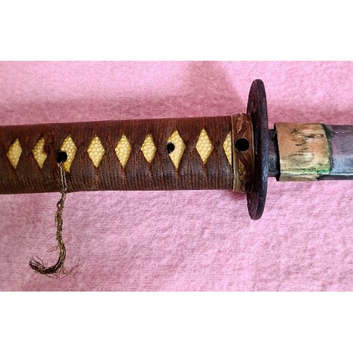 229 - A Japanese WWII officer's katana, signed tang, cast tsuba, cotton bound imitation shark skin grip, m... 