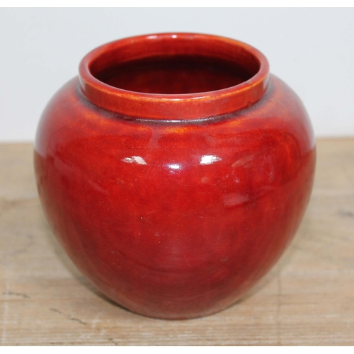 511 - A Burmantofts red glazed vase, no. 234, height 12cm.