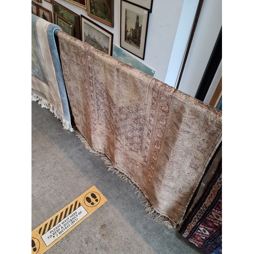 1016 - A vintage Eastern silk carpet with hanging rail, approx 180 cm by 118 cm