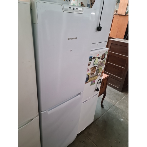 1023 - A Hotpoint fridge freezer.