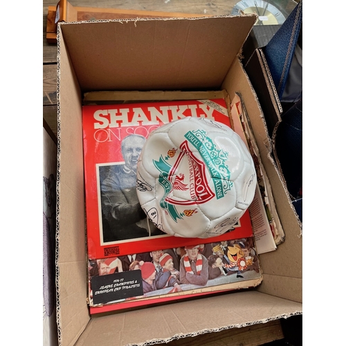 118 - A box of Liverpool FC memorabilia including signed football