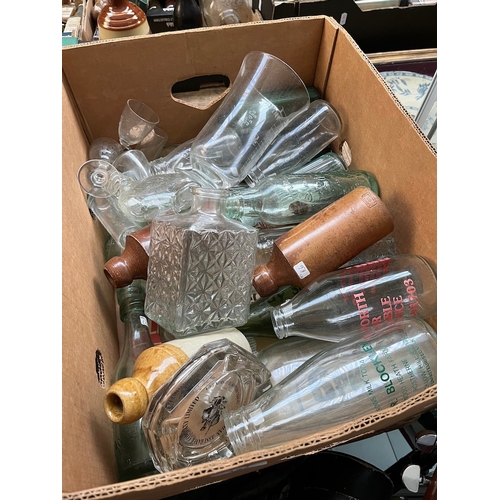 121 - A box of vintage glass bottles, stoneware, earthenware, etc.