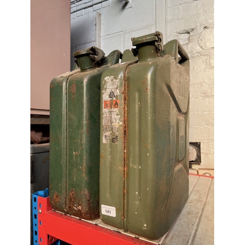 141 - Two petrol jerry cans.