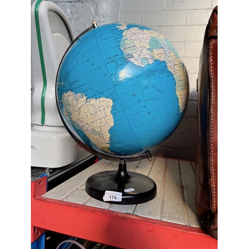 174 - A globe on a stand