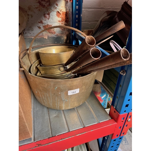 182 - Two brass jam pans and six brass and copper pans.