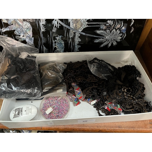 40 - A box of vintage beadwork.