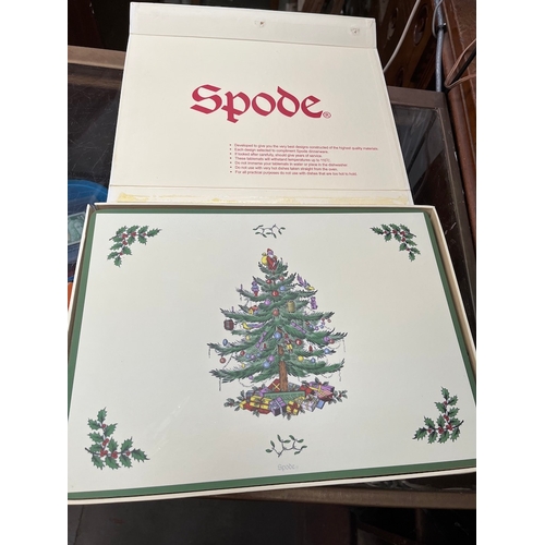 539 - A boxed set of Spode Christmas mats.