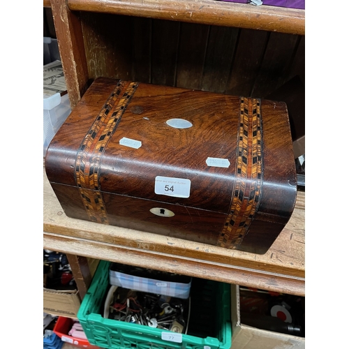 54 - A Victorian inlaid walnut sewing box containing a set of spoons and a shell cat.