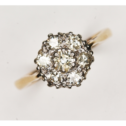 118 - A seven stone diamond cluster ring, total approx. diamond wt. 0.21 carats, colour K/L, clarity VS1/S... 