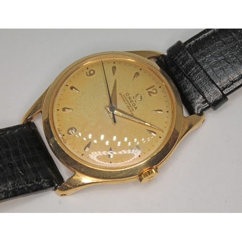 93 - An 18ct gold Omega chronomtre wristwatch, circa 1950s, diameter 35mm, signed gold tone dial sword ha... 