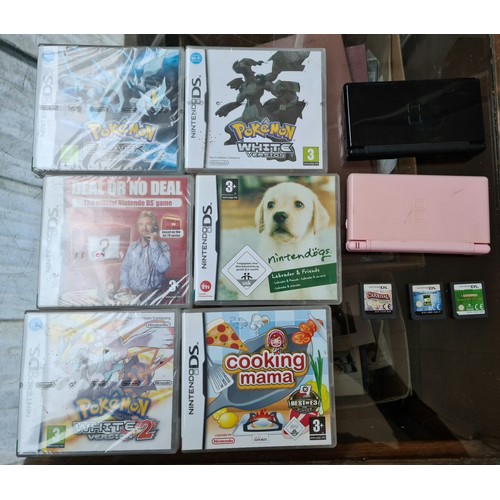 86 - 2 nintendo DS Lites and various games