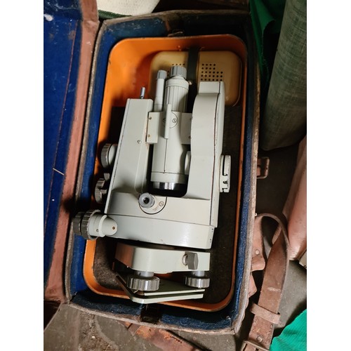 167 - A cased theodolite, stand and earthing rod set.